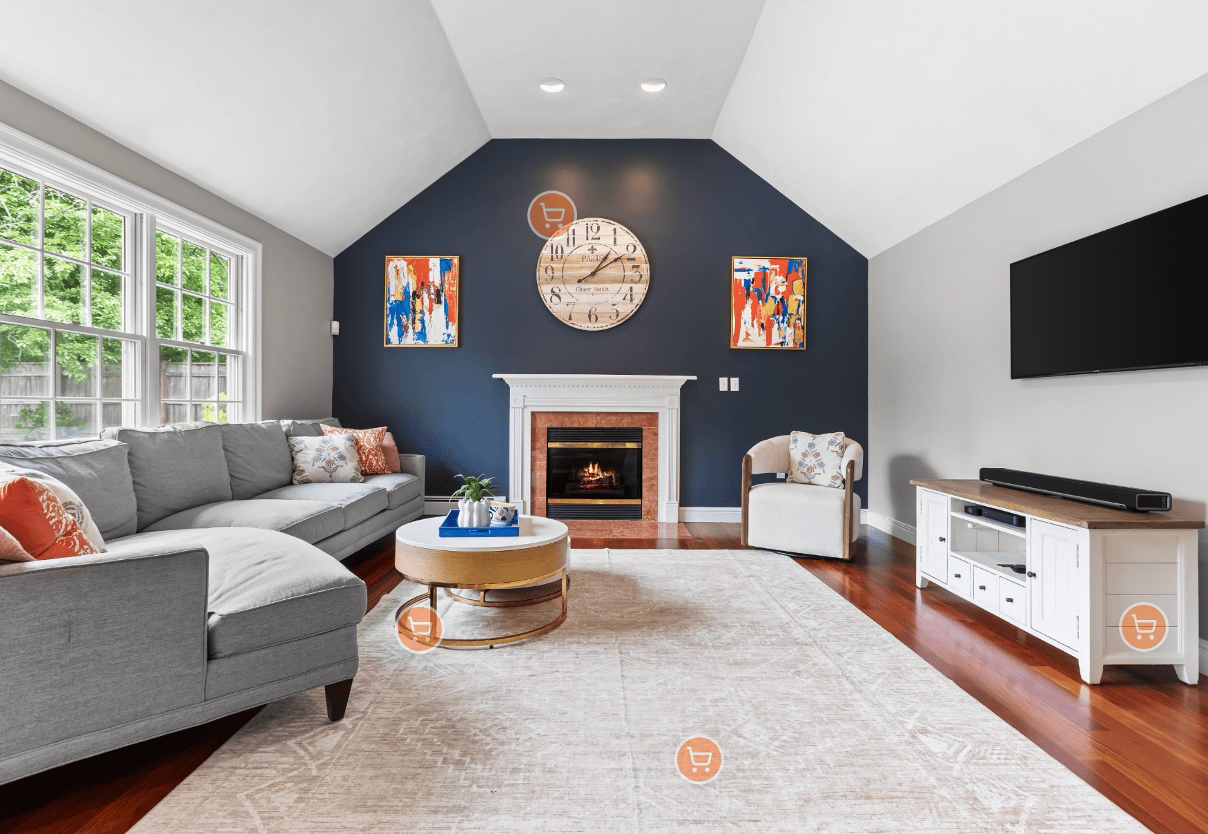 Living room with navy accent wall, fireplace, and modern furniture
